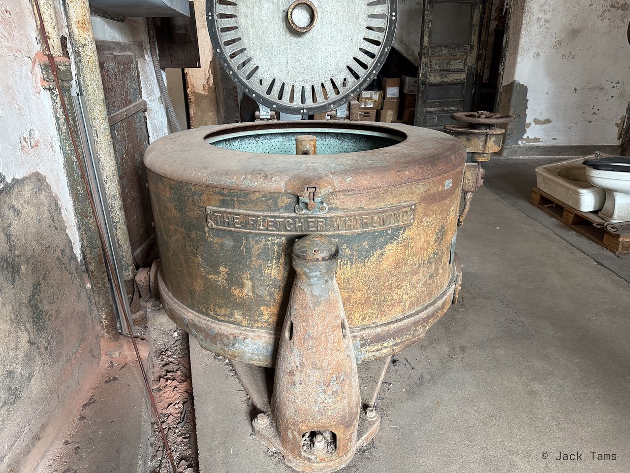 A rusting laundry drum in the hospital's laundry building.
