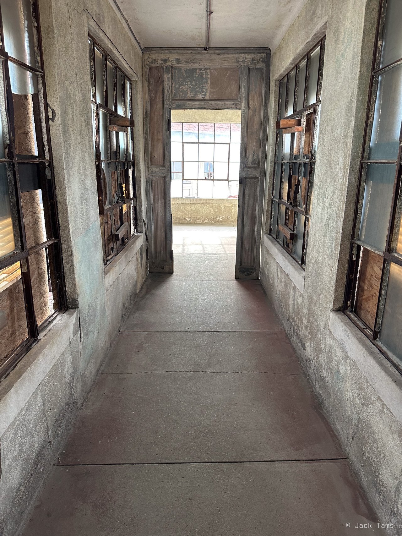 A glazed walkway between the hospital buildings.