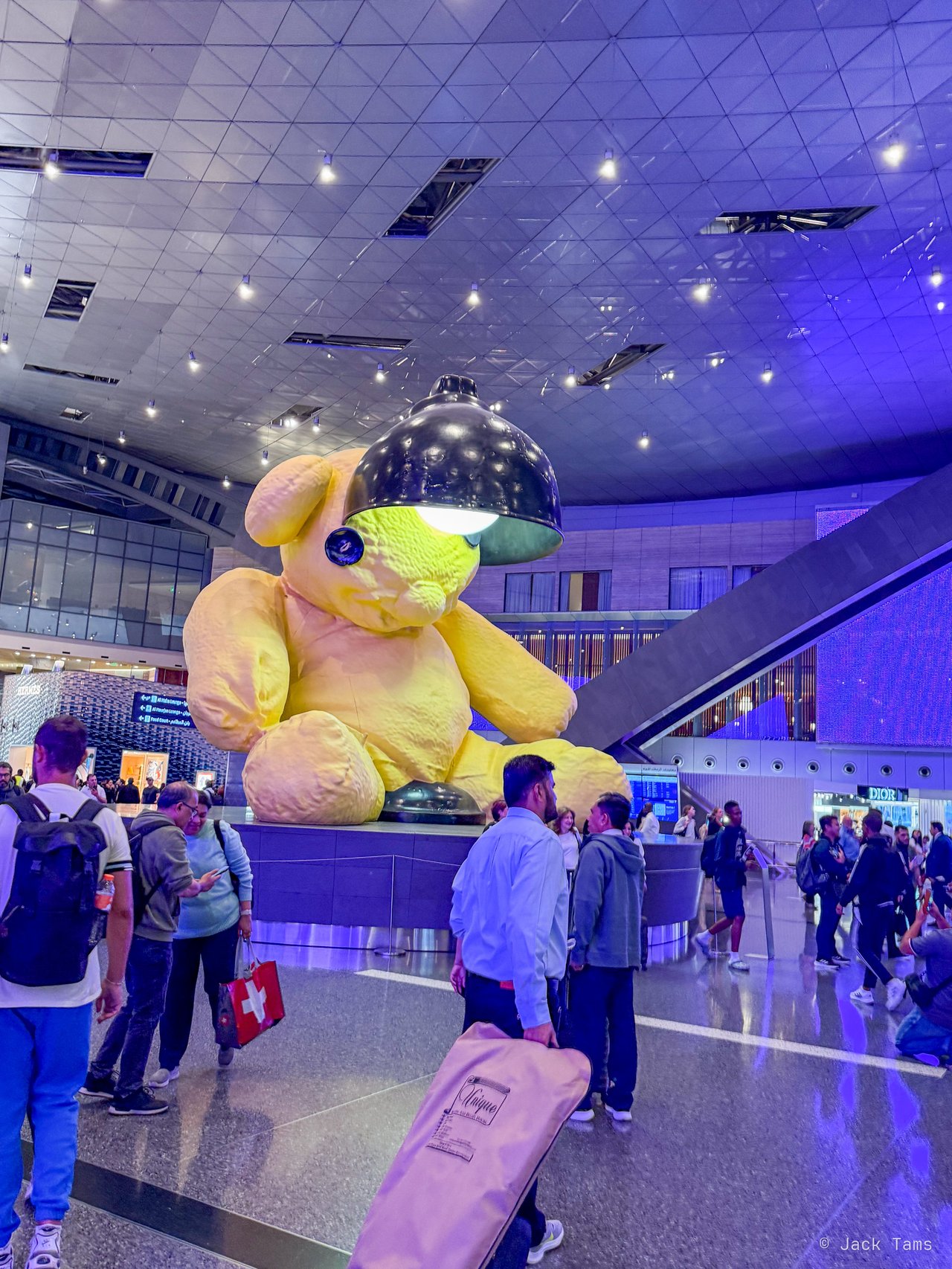Urs Fischer's giant yellow Lamp Bear at Hamad International in Doha, changing planes on the way home.