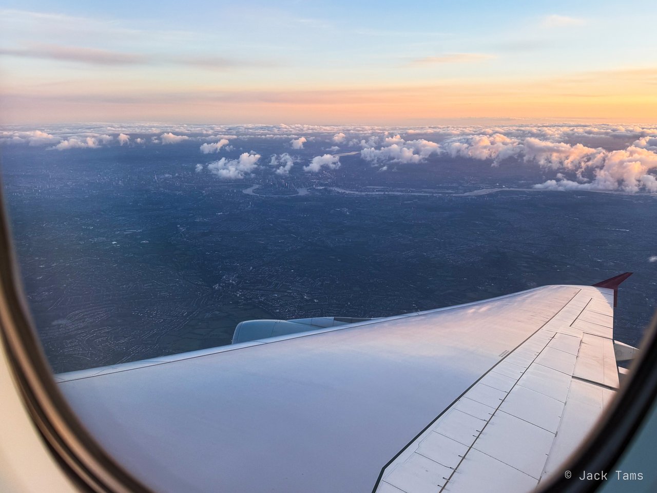 Sunrise over the clouds on the flight home.