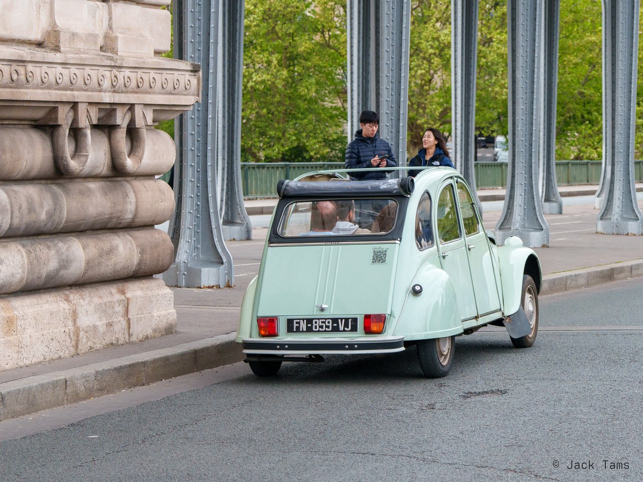 A Citroën 2CV crossing the bridge.