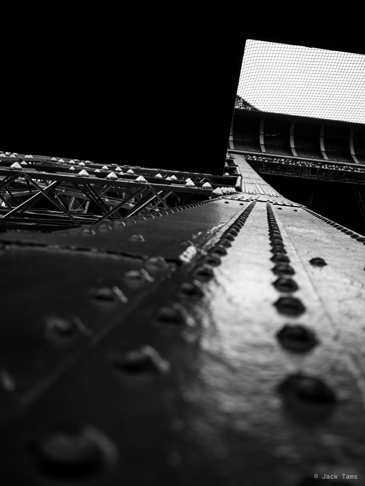 The tower's riveted girders, close up.