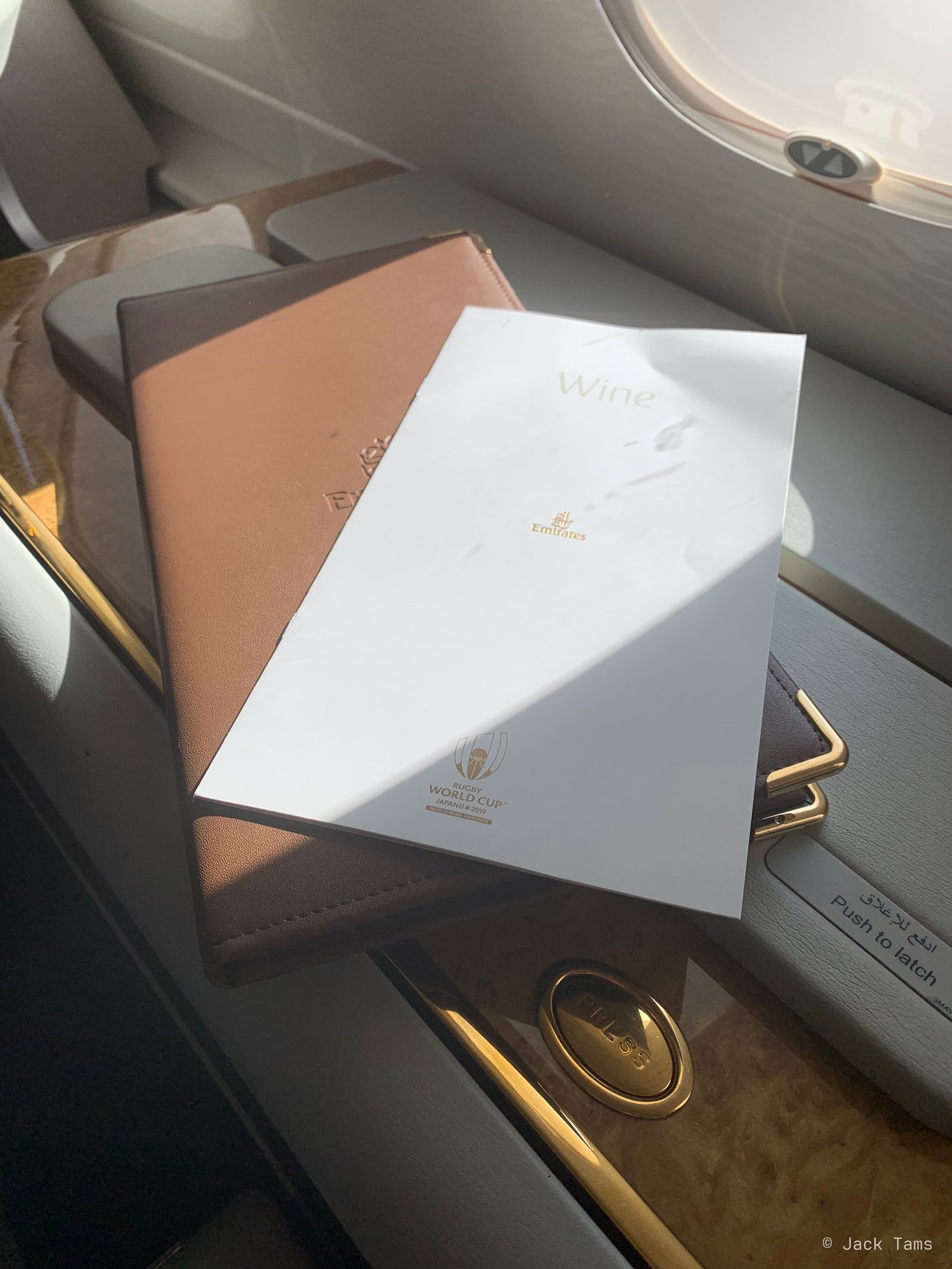 The menu and wallet waiting in the suite.