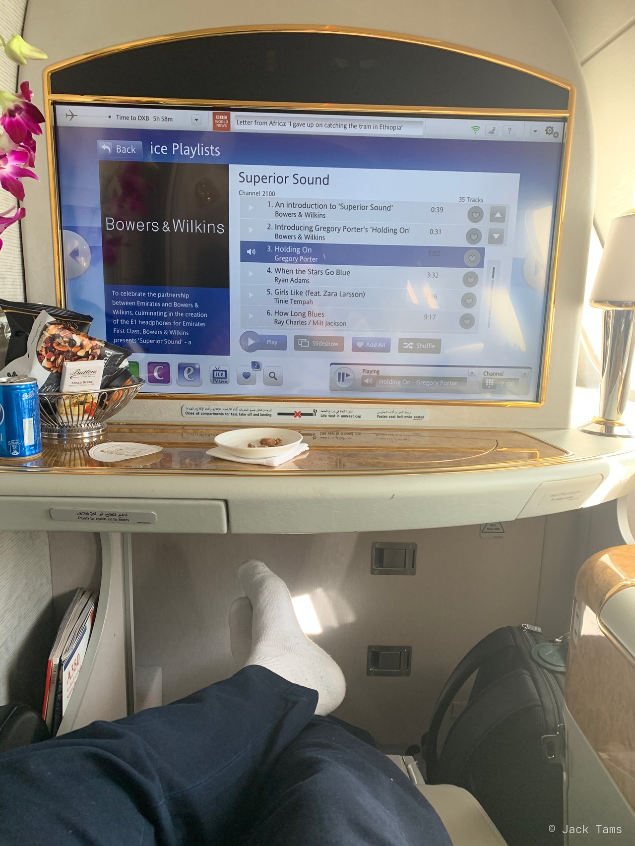 Feet up in front of the screen.