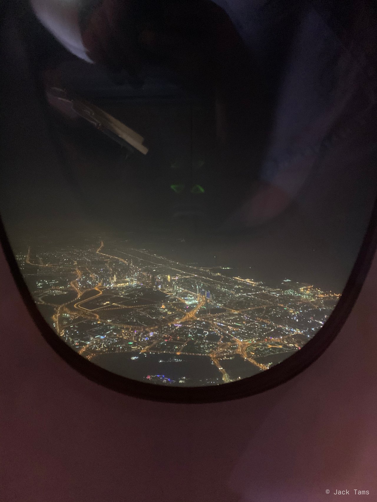Dubai's lights on the approach.