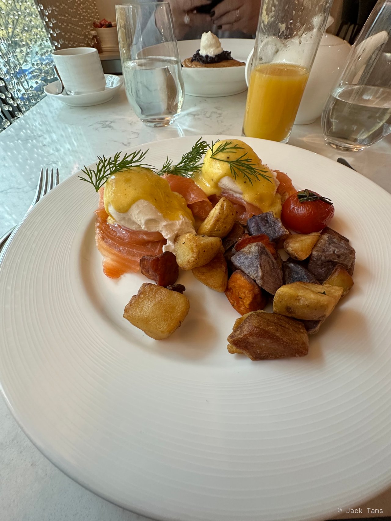 Eggs Benedict with smoked salmon and roast potatoes, the morning after we landed.