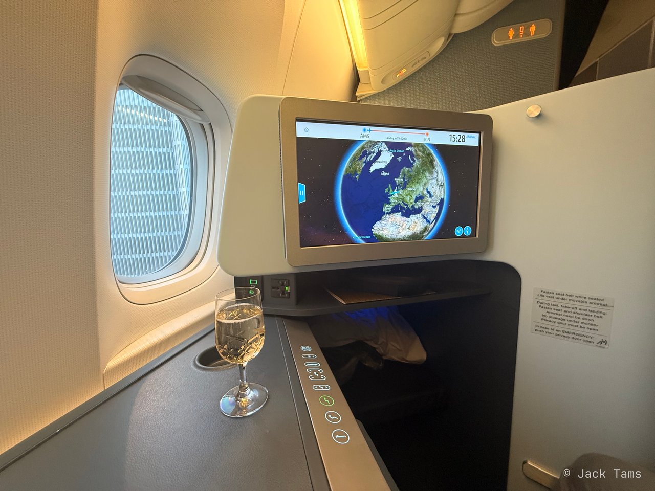 My first time in KLM's new World Business Class suite, with its closing door: 8A, with the moving map before departure.