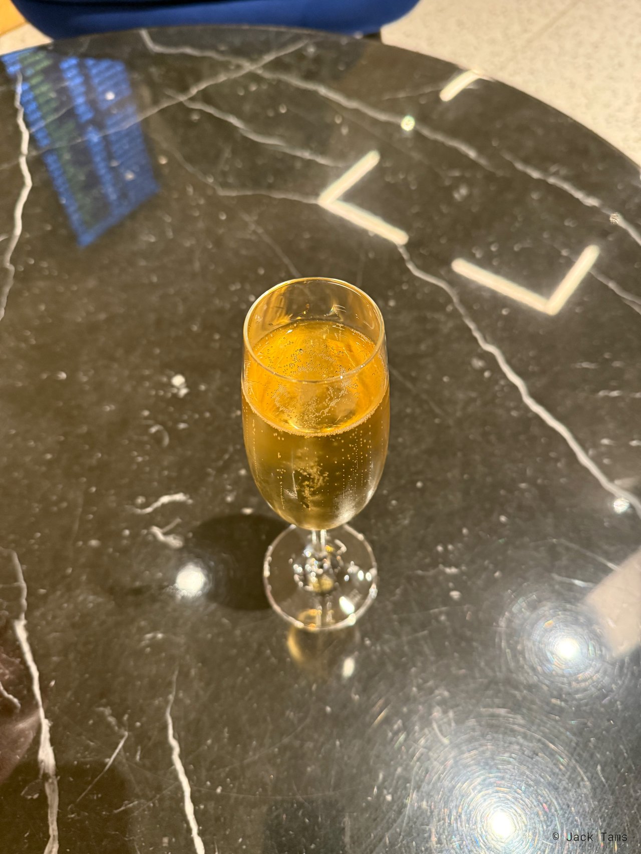 A drink in the lounge before the flight.