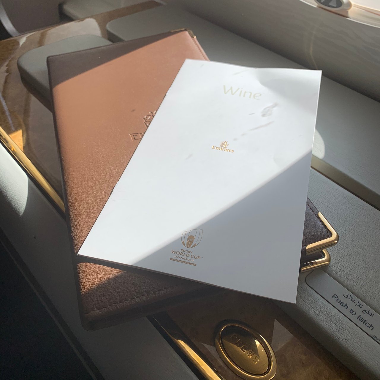 The menu and wallet waiting in the suite.