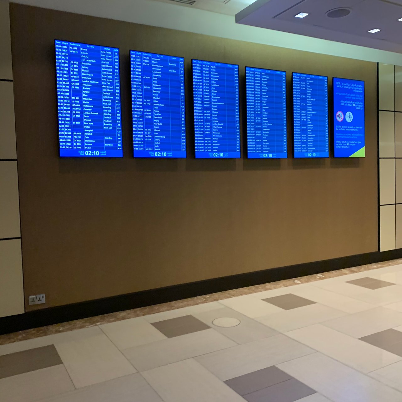 The departure boards, the middle of the night in Dubai.