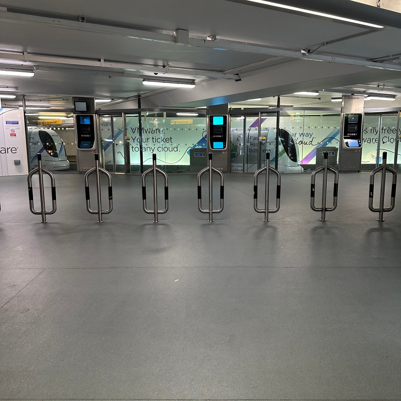 The pod station at Terminal 5, the driverless pods waiting behind the gates (from our February trip).