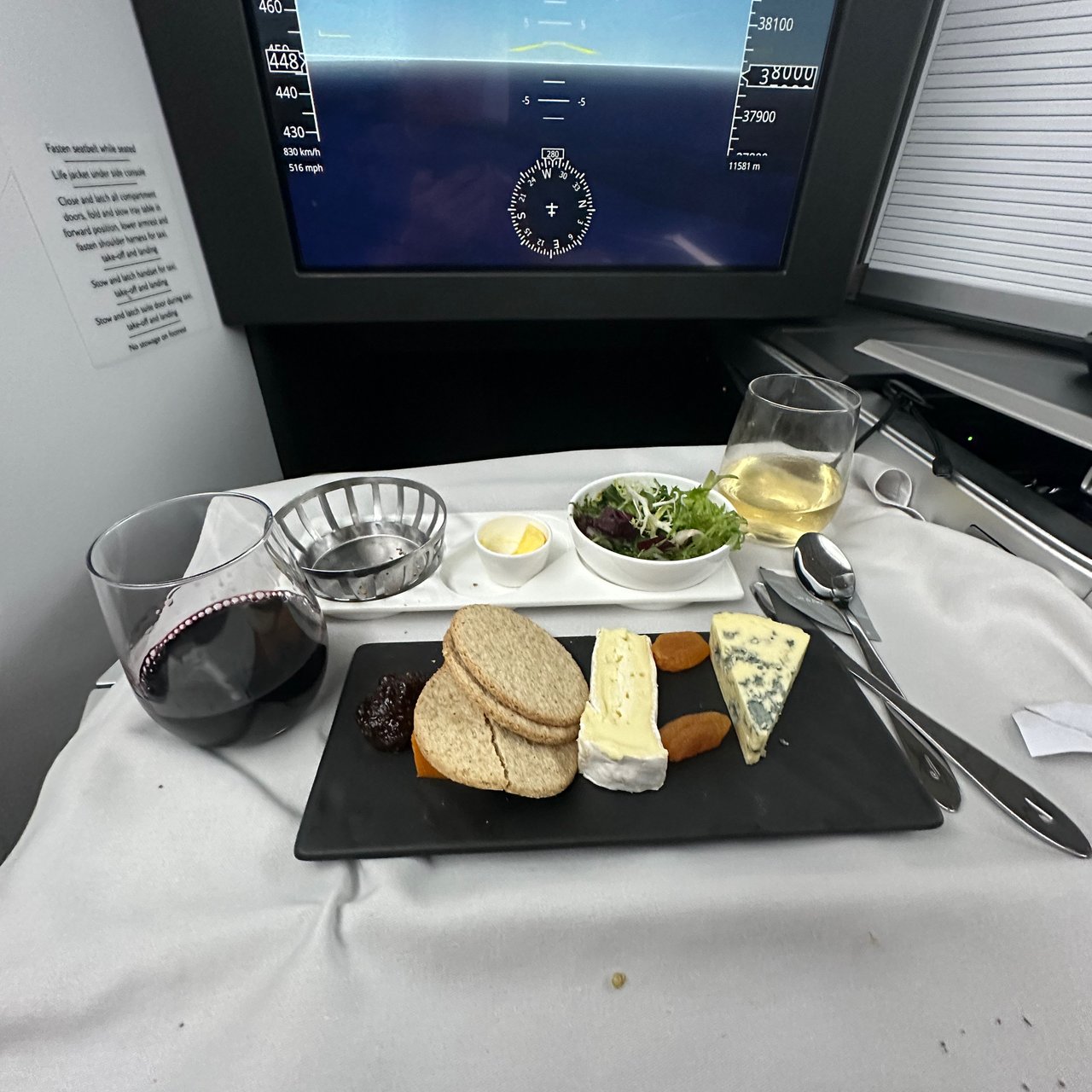 Cashel Blue, Somerset Brie and Red Leicester with fig chutney and crackers, and a glass of red.