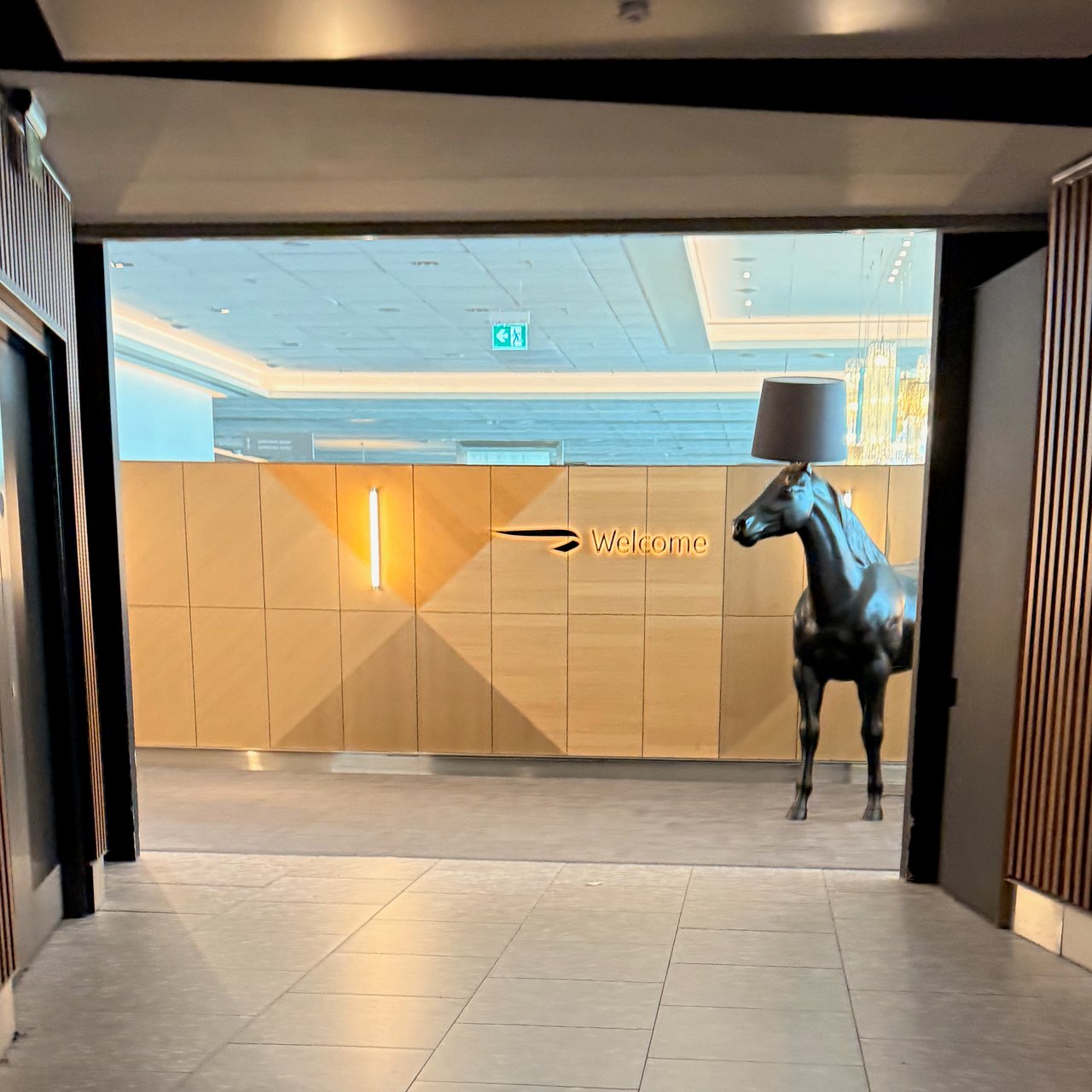 The way into the First lounge, horse lamp and all. It isn't the Concorde Room: that's through here.