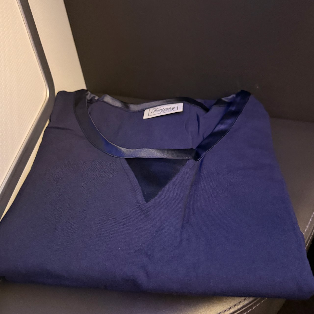 First pyjamas, laid out on the seat.