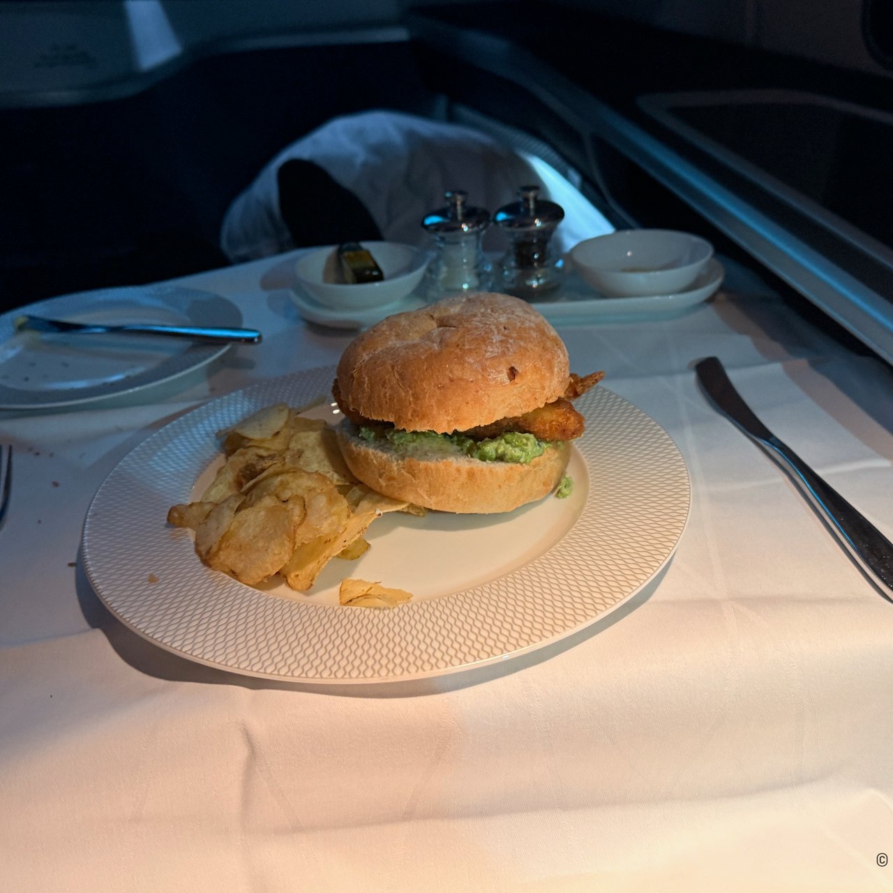 Fish finger butty: North Atlantic cod and tartare sauce in a potato bun, with salt and vinegar crisps.
