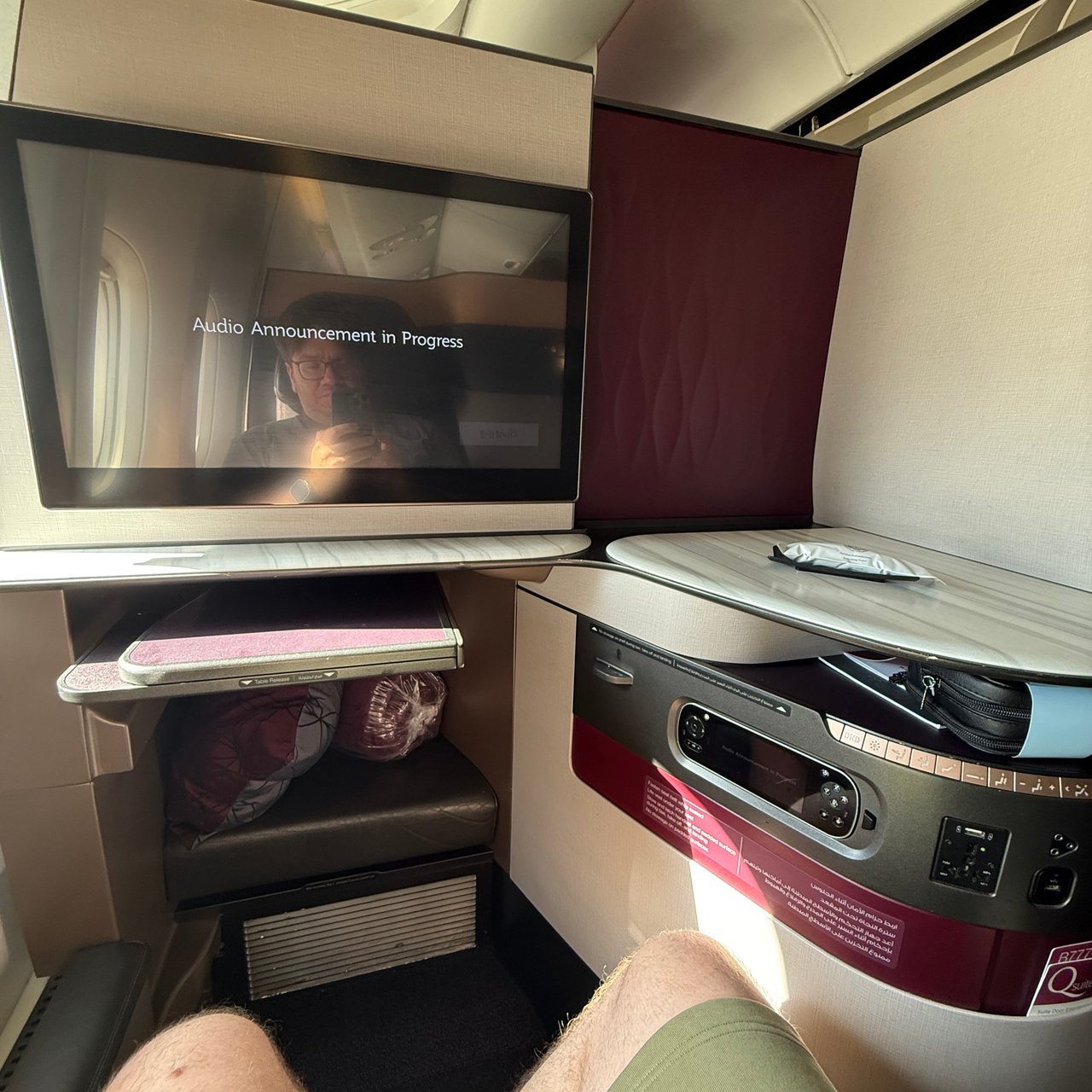 Feet up in front of the screen.