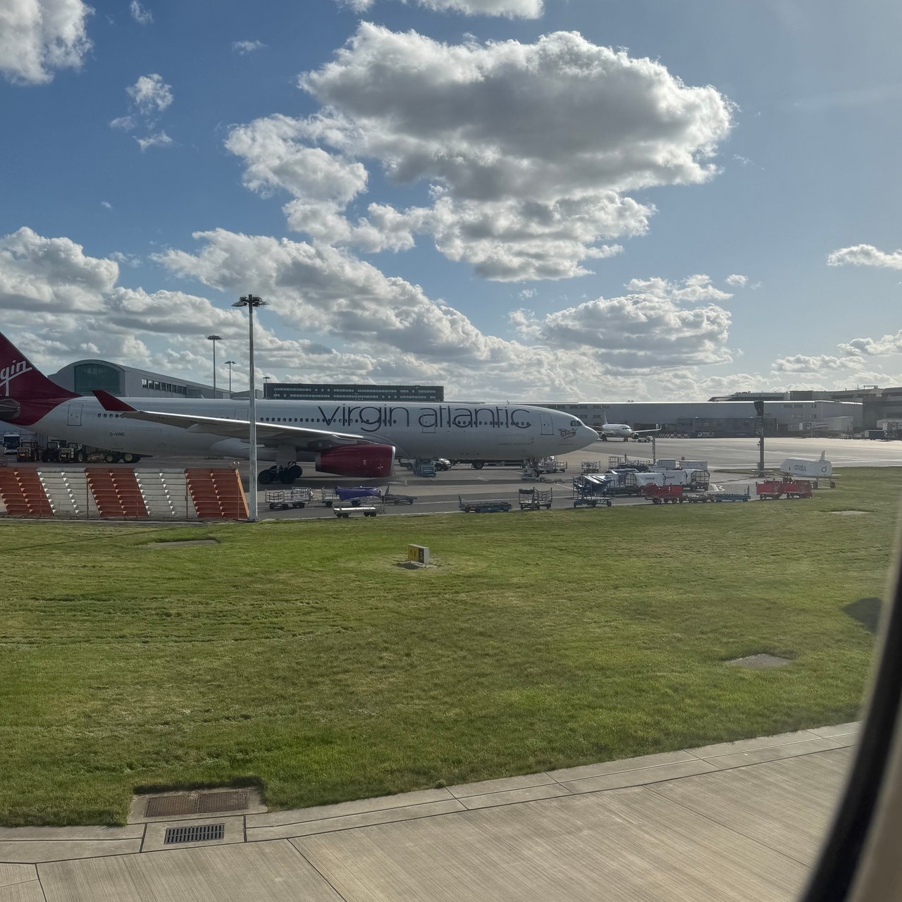 A Virgin Atlantic Airbus A330 across the grass while we waited to line up.