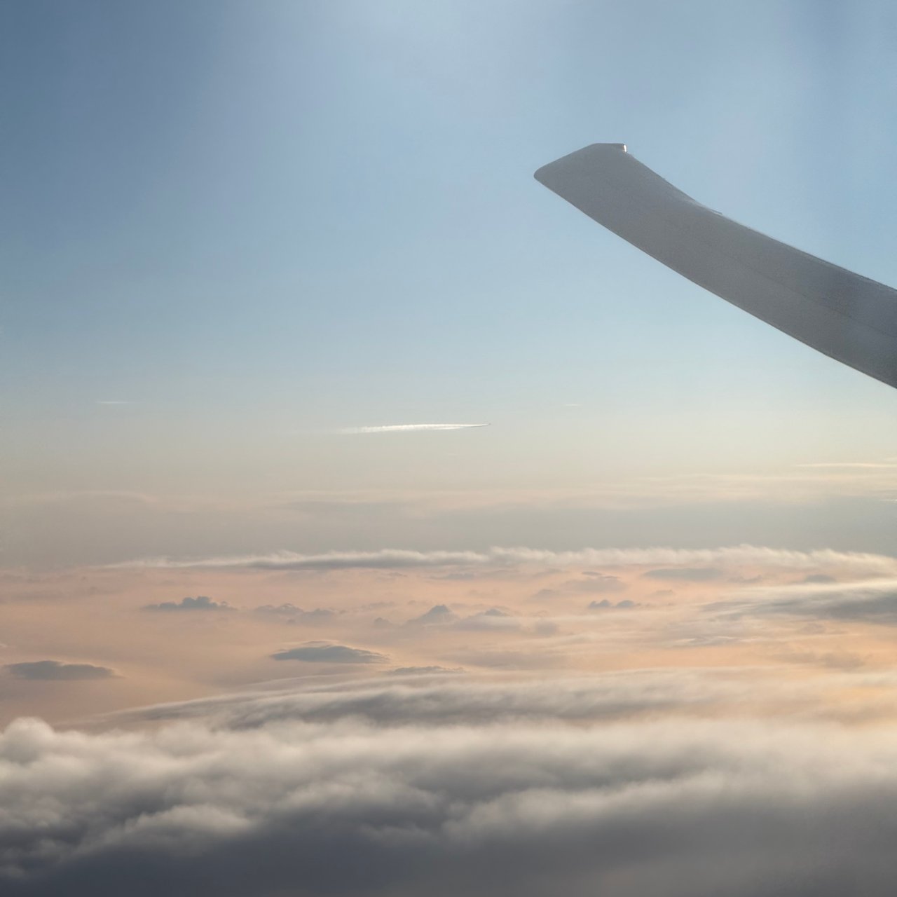 The 777's wing at sunset.